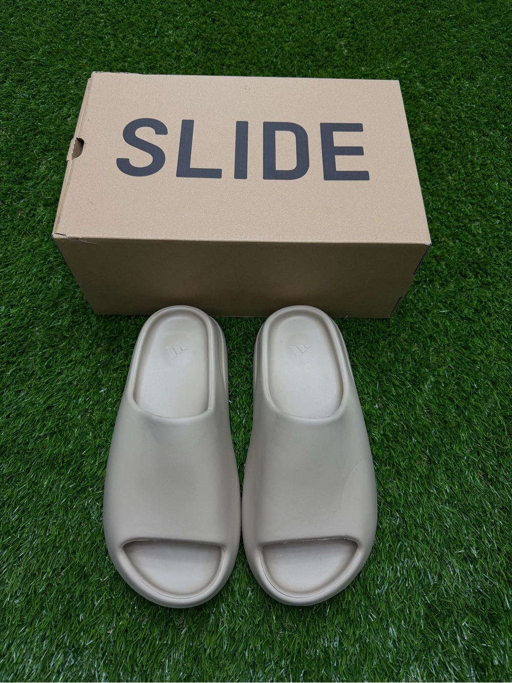 Adidas Yeezy slides “pure” colorway